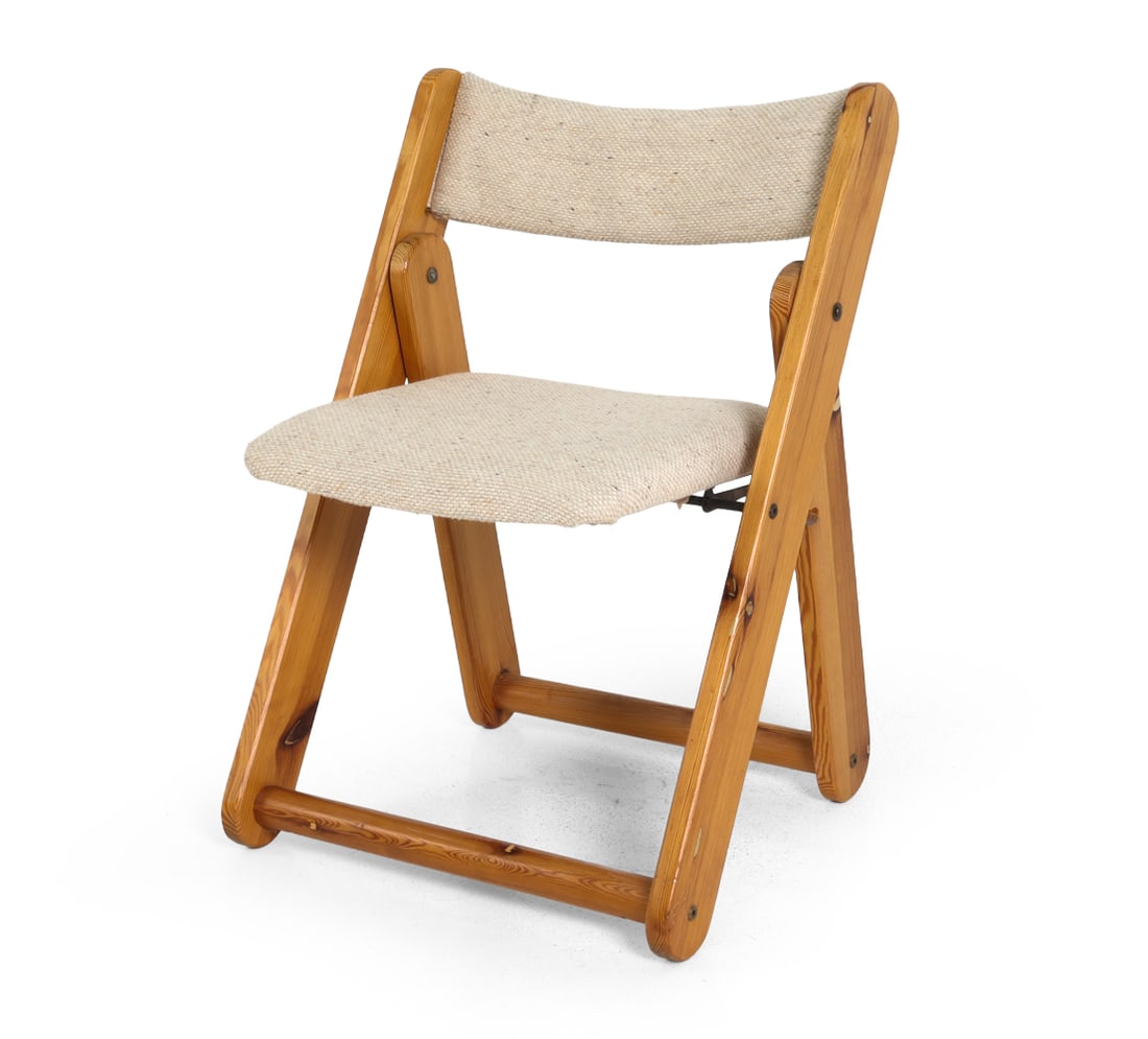 GILLIS LUNDGREN KON-TIKI PINE FOLDING CHAIR 1970S: For IKEA. Apparently unmarked. Sweden, circa 1970s. Dimensions: H 30.25" x W 21.5" x D 22" x SH 17.8". Condition: Scuffs and dings to wood. Wear consistent with age and use. PT184