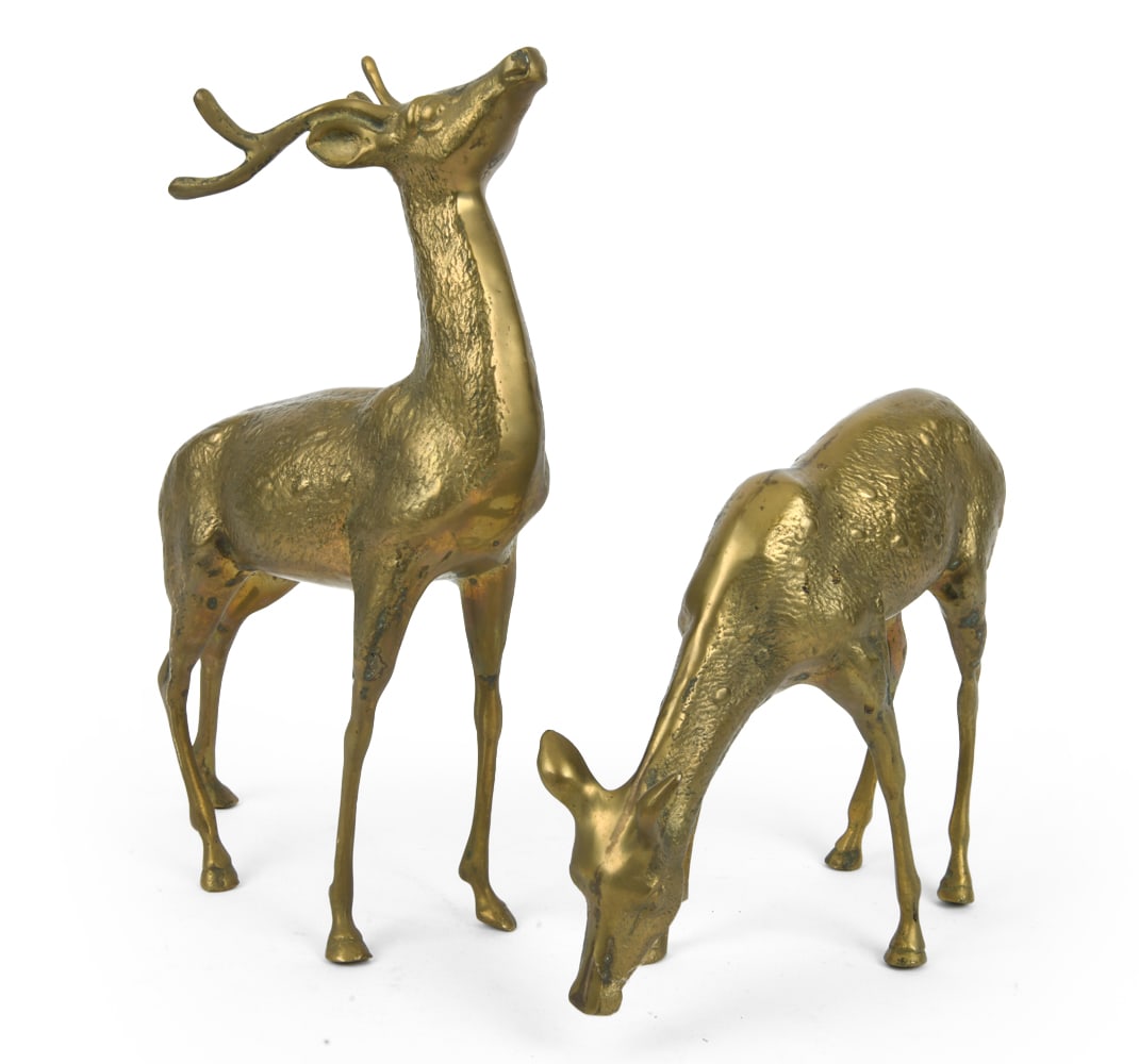PAIR OF BRASS DEER SCULPTURES: 20th century. Dimensions: Largest H 15" x W 9" x D 3". Condition: Scuffs and rubs, some spots of oxidation. Wear consistent with age and use.