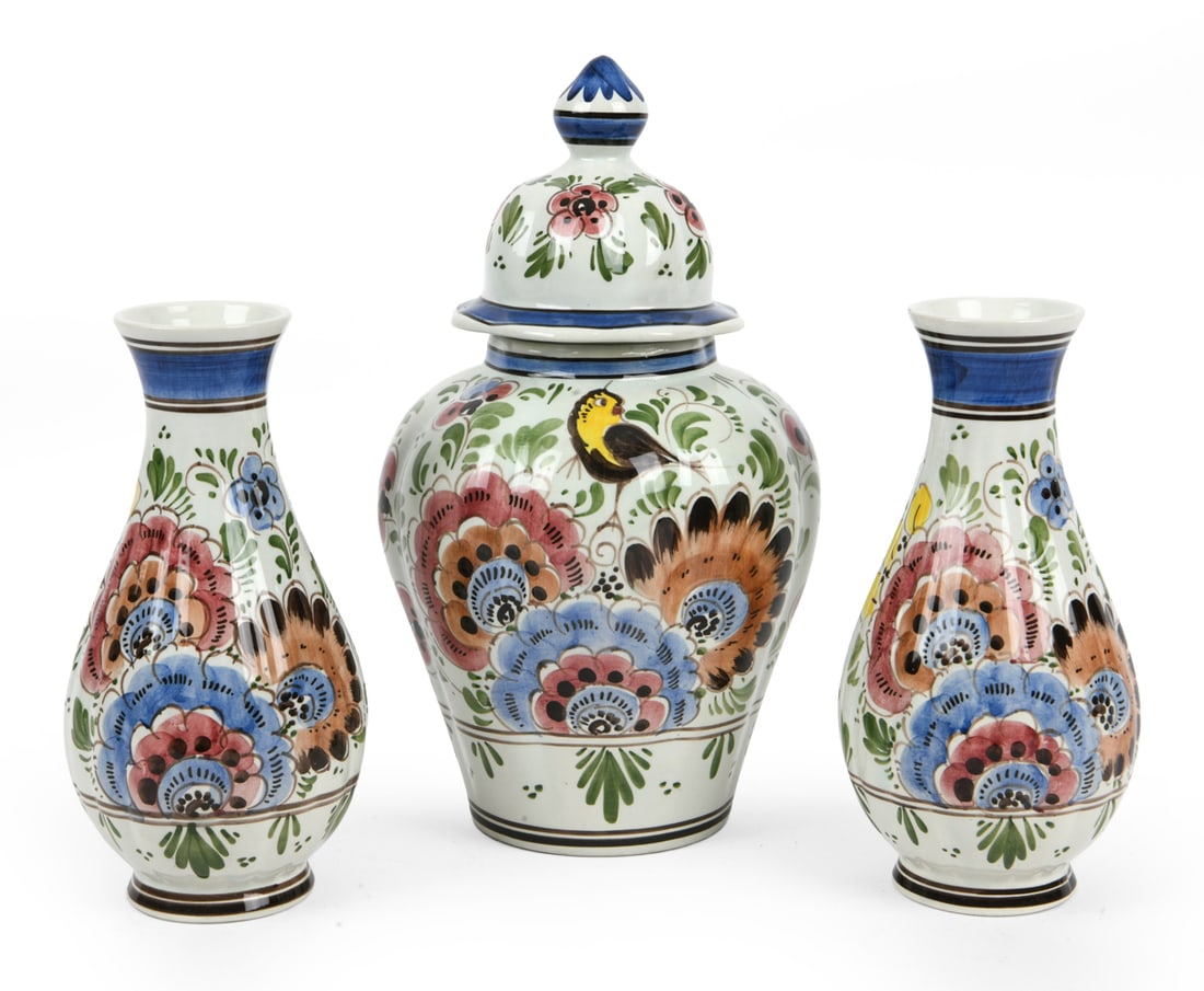 DELFT CERAMIC GROUPING: A covered urn and two vases. Dimensions: Largest H 12.5" x Dia. 6.5". Condition: Light scuffs, wear consistent with age and use. PT196