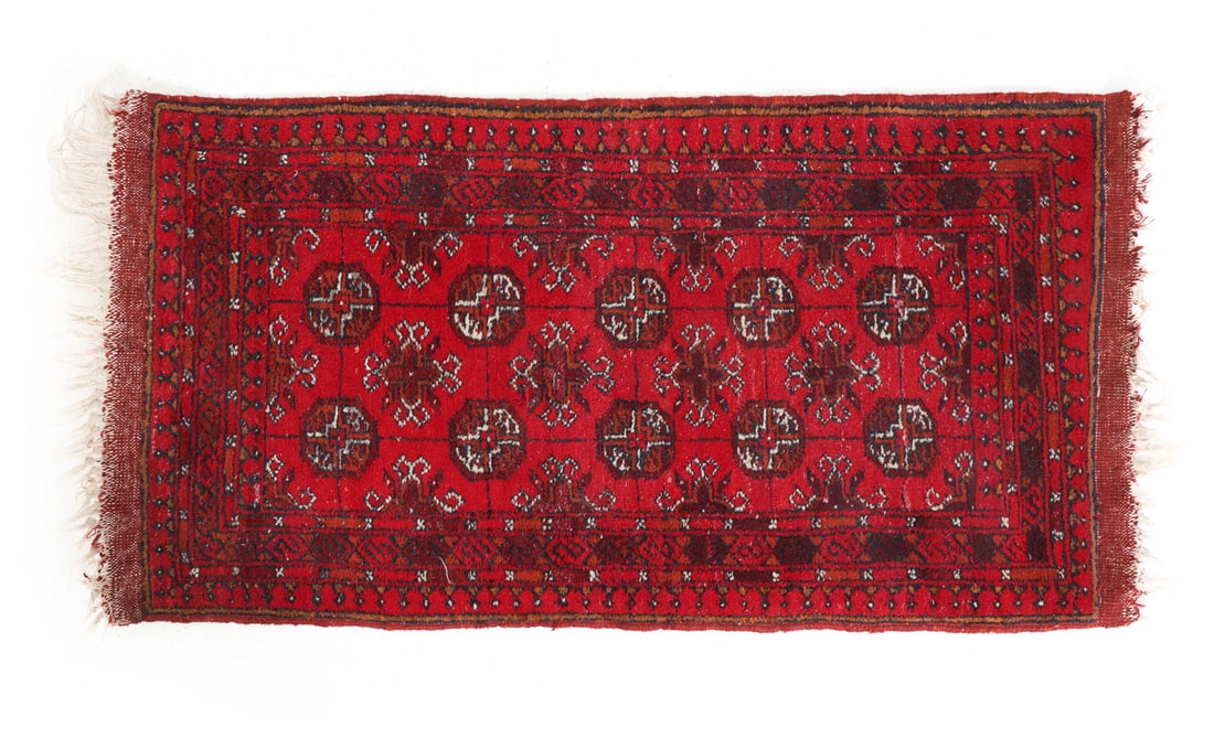 VINTAGE PAKISTANI LAHORE RUG: Dimensions: L 47" x W 22". Condition: Fading and losses to fringe. Wear consistent with age and use. PT126