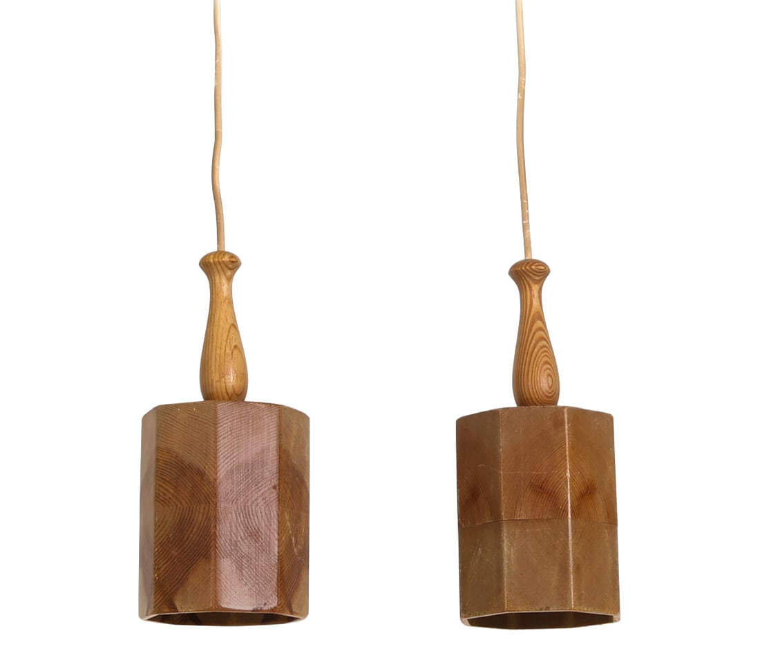 PAIR OF JEMPTLAMPAN SWEDISH PINE PENDANT LIGHTS: Marked next to socket. Sweden, circa 1970s. Dimensions: H 10.5" x W 4.25" Condition: Scratches to wooden spindle and slight splitting of wood on shade. Both spindles are slightly loose. Untested.