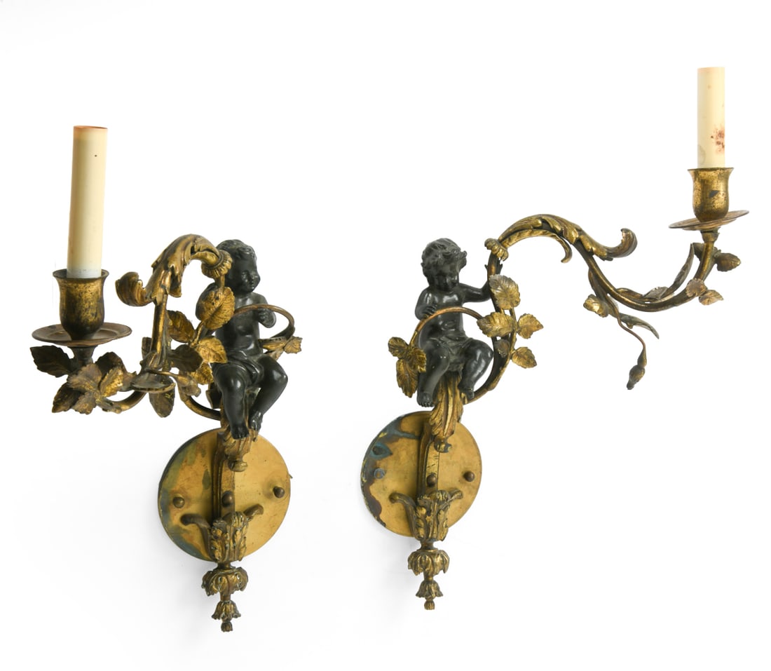 ANTIQUE FRENCH GILT BRONZE CHERUB WALL SCONCES: Dimensions: H 15.5" x W 5" x D 13.5". Condition: Wiring untested. Patina to surface. Scuffs, scratches, and rubs. Wear consistent with age and use.