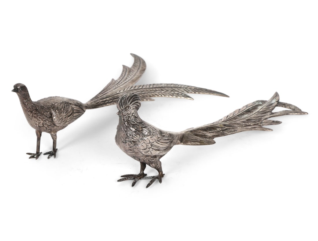 ITALIAN .800 SILVER PHEASANTS: Male and female pheasants. Marked to tail. Italy, circa 20th century Dimension: H 3" x W 1.75" x D 7" Condition: Light surface wear consistent with age. Some light tarnishing.