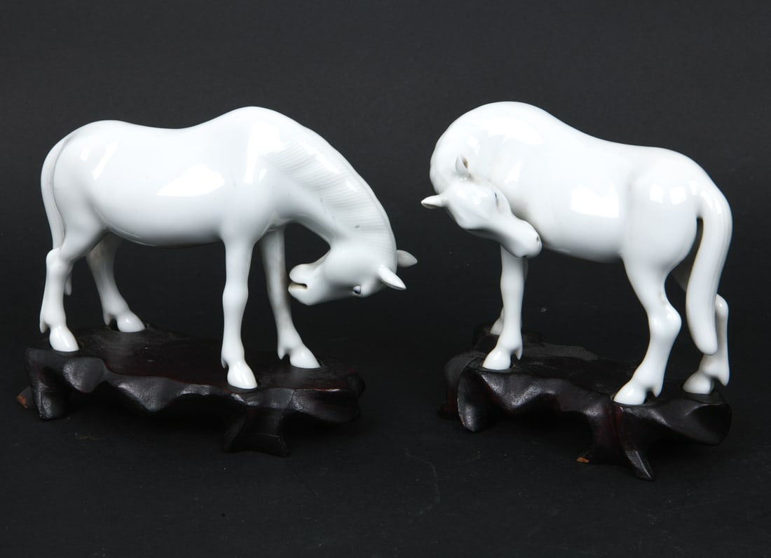 PAIR CHINESE BLANC DE CHINE PORCELAIN HORSES: Marked underneath. Dimensions: On Bases H 5.5" x W 6". Condition: Light scuffs. Wear consistent with age and use.