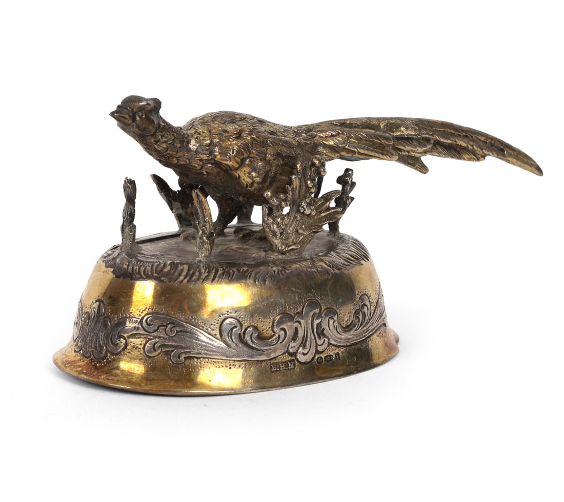 GERMAN STERLING SILVER PHEASANT PLACECARD HOLDER: Imported by Berthold Hermann Muller at the London Assay Office. Hallmarked. Early 20th century. Weight: 2.6ozt. Dimension: H 2.25" x W 2" x D 4.5" Condition: Dents, tarnish, surface wear consistent
