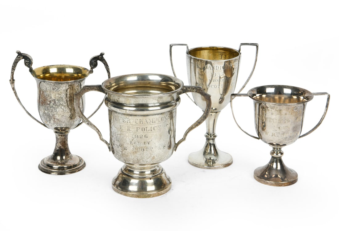 ENGLISH STERLING SILVER SHOOTING TROPHIES: England, circa 20th century. Weight: 7.25ozt Dimensions: (Tallest) H 4.5" x W 3" x D 2" Condition: Natural patina, minimal dents. Wear consistent with age and use.
