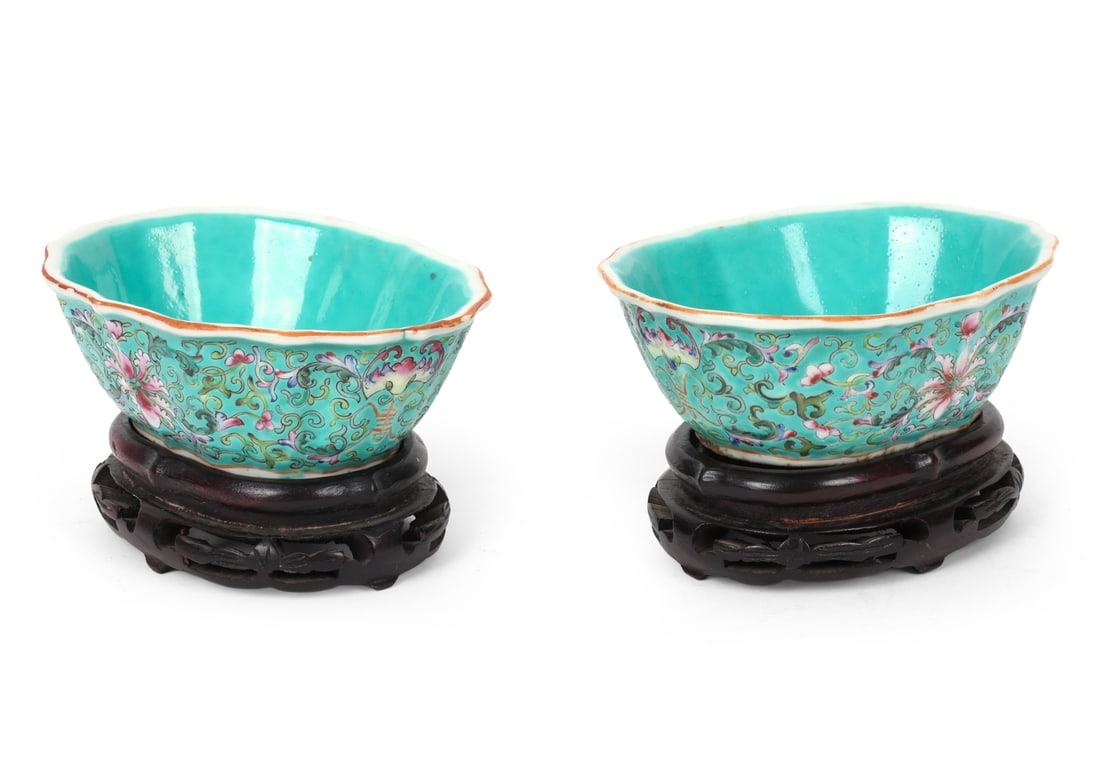 CHINESE FAMILLE ROSE PORCELAIN BOWLS: Bowl and base detached. Marked underneath. China, circa 19th century. Bowl is quatrefoil shaped with a wood base. Dimension: H 3.75" x W 6.25" x D 5.25" Condition: Faint stress crack to one bowl,