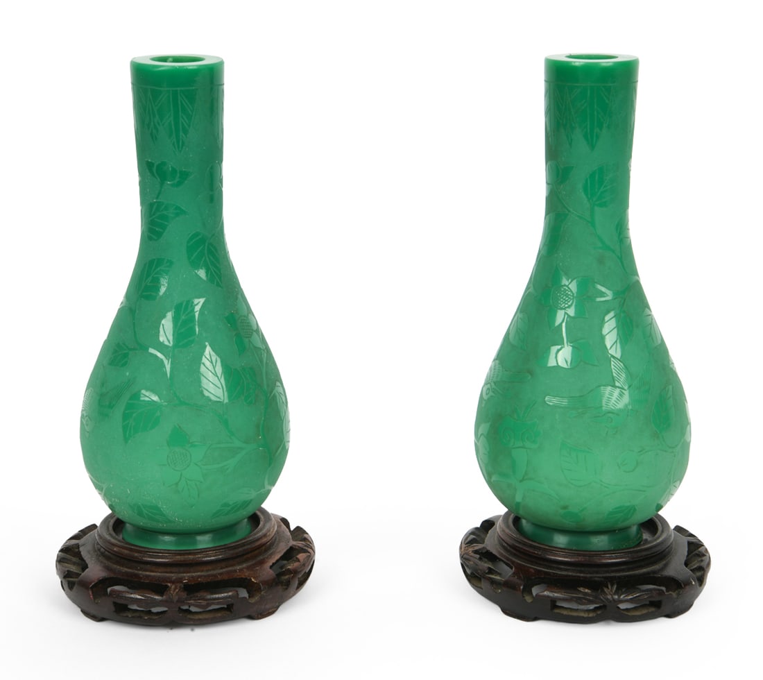 PAIR CHINESE PEKING GLASS VASES ON WOODEN STANDS: Dimensions: (On stand) H 9.5" x Dia 4.5" Condition: Chips and nicks to edge. Minor scuffs and scratches. Wear consistent with age and use. Old adhesive residue to center on stand.