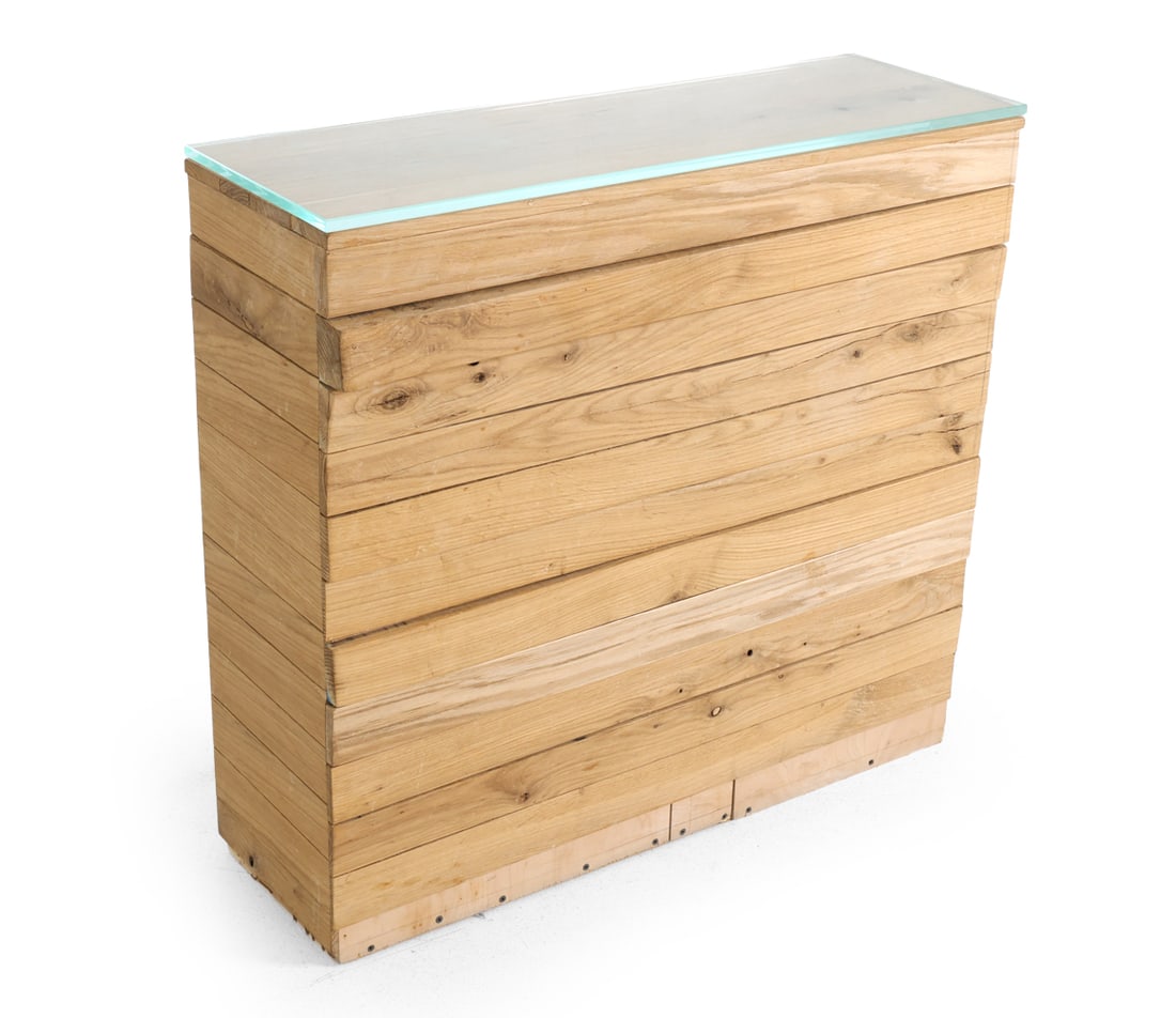 CUSTOM BRUTALIST WOODEN CONSOLE TABLE: Glass top, with interior storage accessed from open side. Dimension: H 32" x W 34" x D 11.5" Condition: Open on one side for storage, Minor stress cracks to boards on face, wear consistent with age