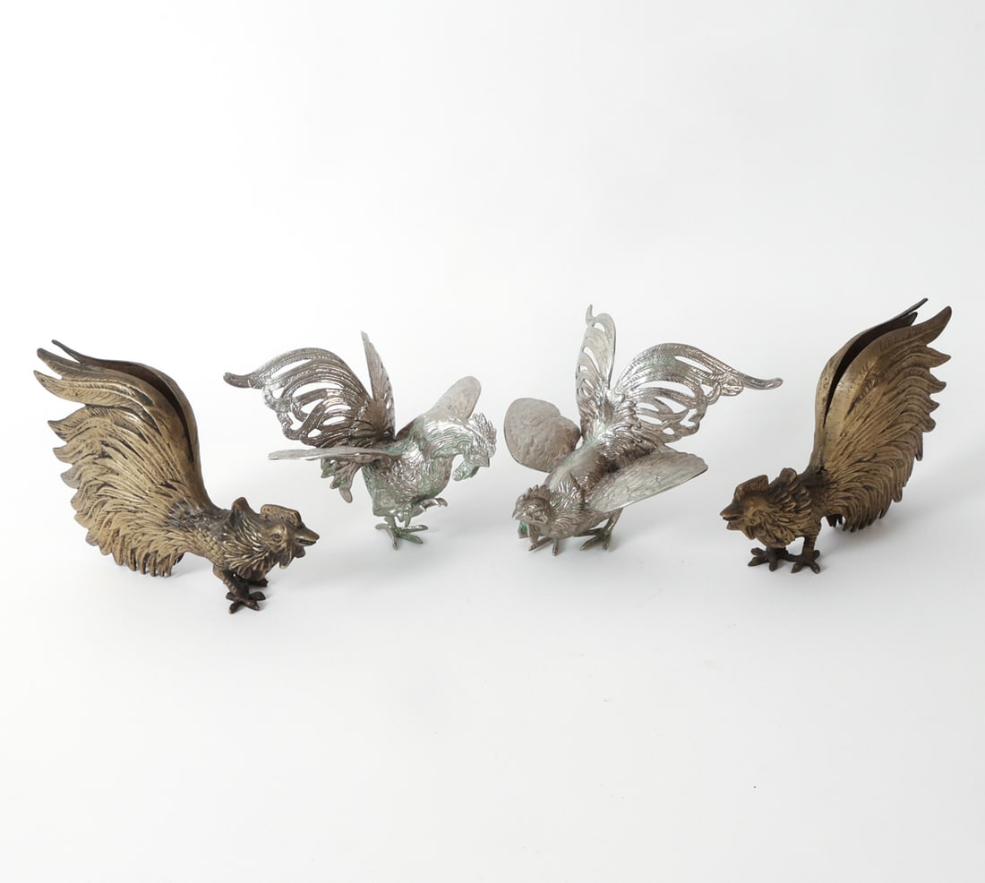 BRASS & SILVER PLATE CHICKEN GROUPING: Grouping includes a pair of brass and a pair of silver plate decorative chickens. Dimensions: (Largest) H 6" x W 10" x D 2" Condition: Wear consistent with age and use. Some patina and oxidation.