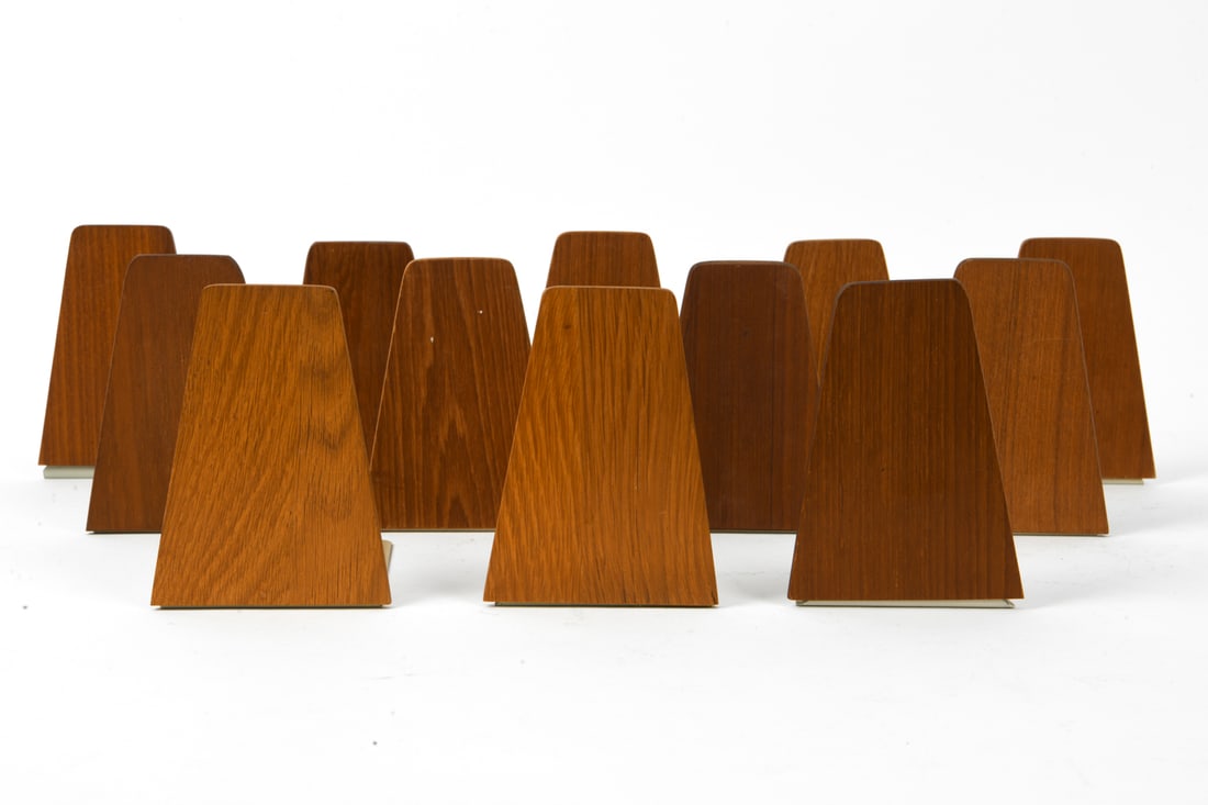 ATTR. KAI KRISTIANSEN TEAK BOOKENDS: Dimensions: H 5.5" x W 3.5" x D 5.5" Condition: Minor scuffs on wood and metal, wear consistent with age and use.