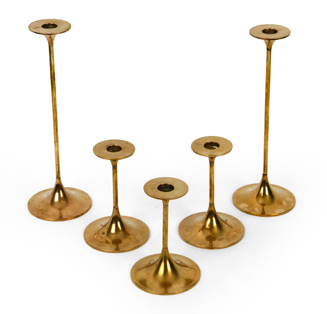 MAX BRUEL FOR TORBEN ORSKOV CANDLESTICK GROUPING: Marked underneath and to candle slots. Denmark, circa 1960s. Dimensions: Tallest H 10.5" x Dia. 3.75". Condition: Patina to brass. Wear consistent with age and use.