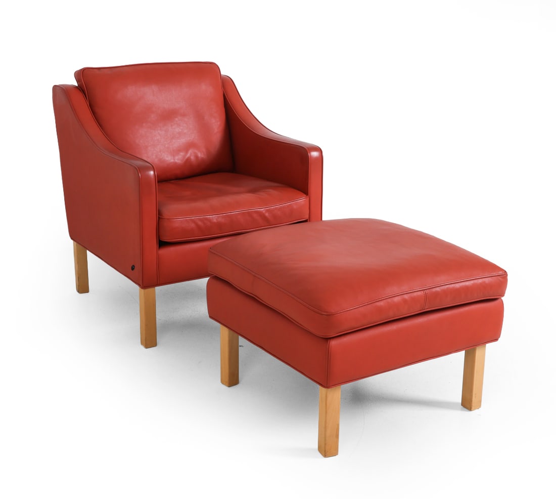 HURUP DANISH LEATHER LOUNGE CHAIR & OTTOMAN: Leather upholstery with beech legs. Tagged to side. Denmark. Dimensions: H 32" x W 29" x D 28" x SH 17.5". Ottoman H 18" x W 24". Condition: Light scuffs to legs. Wear consistent with age and use.