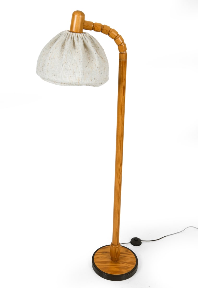 SOLBACKENS SVARVERI PINE FLOOR LAMP: Sweden, circa 1970s. Head articulates, base is metal., shade is textile. Apparently unmarked. Dimensions: H 57.5" x W 10" Condition: Minor scuffs on base. Wear consistent with age and use. Untested.
