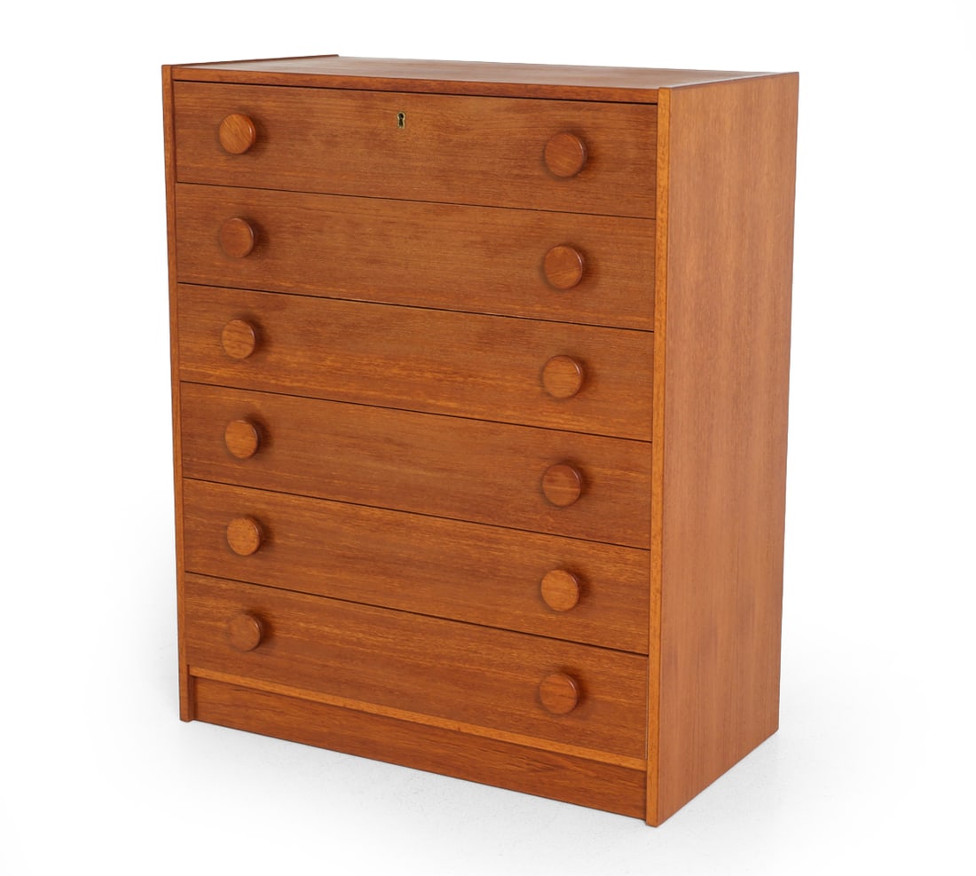 DANISH TEAK CHEST OF DRAWERS C. 1960S: Six-drawer chest with round pulls. Denmark, circa 1960s. Dimensions: H 37" x W 30" x D 15.5" Condition: Wear consistent with age and use. Lacking key. Some minor nicks to corners & edges. F072