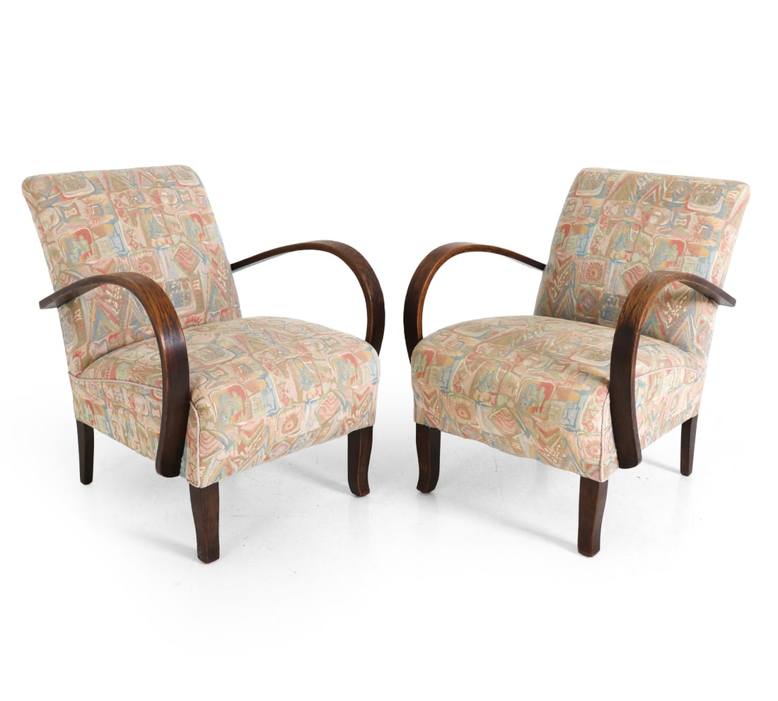 PAIR STYLE OF HALABALA CZECH LOUNGE CHAIRS: Stained beech legs with geometrical pattern upholstery. Czechoslovakia, circa 1940s. Dimensions: H 32" x W 23" x D 33" x SH 16.5" Condition: Wear consistent with age and use. Rubs to armrests. Nicks