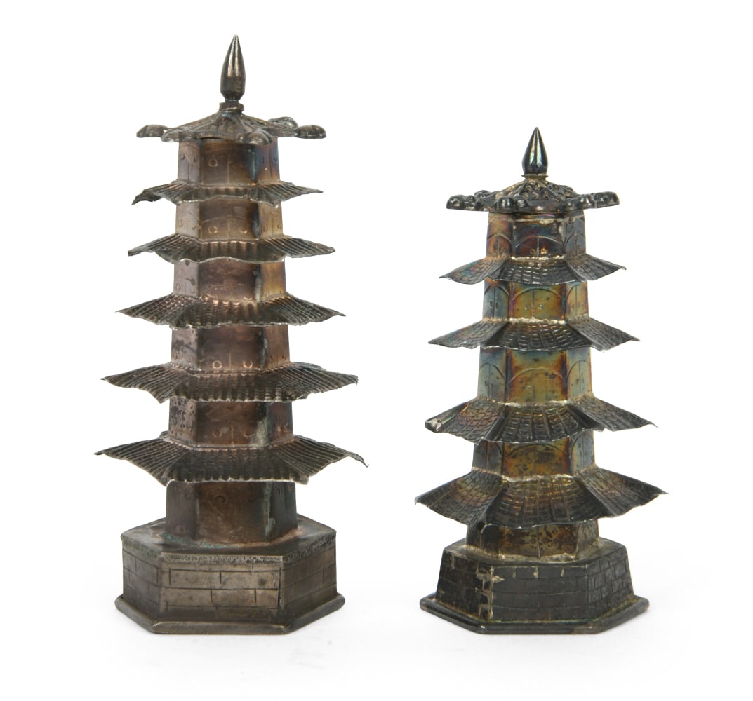 PAIR OF STERLING PAGODA SALT & PEPPER SHAKERS: Marked underneath. Total Weight: 1.37 ozt. Dimensions: H 3.75". Condition: Tarnish and wear consistent with age and use.