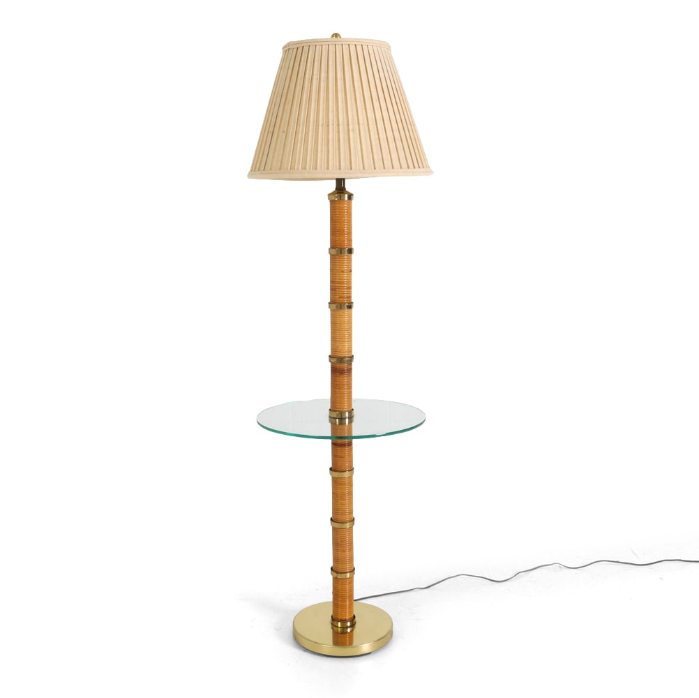 HOLLYWOOD REGENCY STYLE BAMBOO & GLASS LAMP TABLE: Dimensions: H 57.5" x Dia. 16". Condition: Wiring untested. Scuffs and rubs to metal and bamboo. Fading to shade. Wear consistent with age and use.
