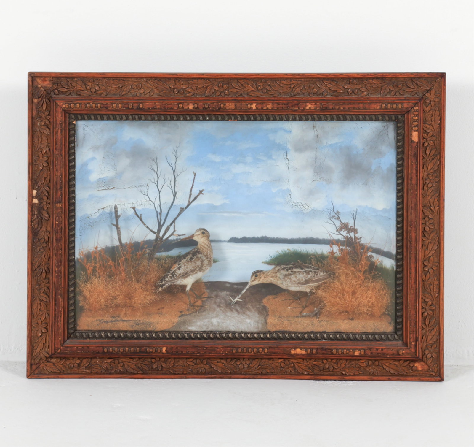 ANTIQUE BIRD DIORAMA: Dimensions: H 26.25" x W 35" x D 6" Conditions: Wear consistent with age and use, Showing a few areas of craquelure, Loss to trim,