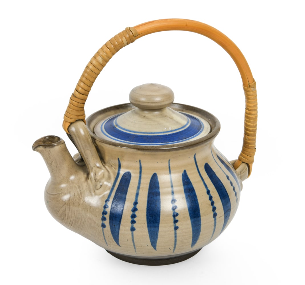 WILLER KERAMIK DANISH CERAMIC TEAPOT C. 1960S: Ceramic tea pot with woven handle. Marked underneath. Dimensions: H 10" x W 10" x D 7". Condition: Previous repair to lid. Wear consistent with age and use, including minor scratches. DA_94