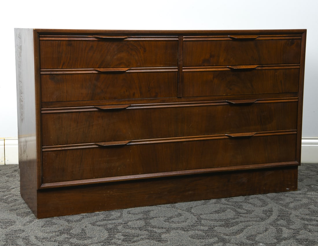 SCANDINAVIAN ROSEWOOD CHEST OF DRAWERS C. 1960S: Rosewood chest of drawers elongated molded drawer pulls. Scandinavian, circa 1960s. Dimensions: H 26.5" x W 43.5" x D 15". Condition: Rubs and scuffs to top, chip to corner. Wear consistent with age