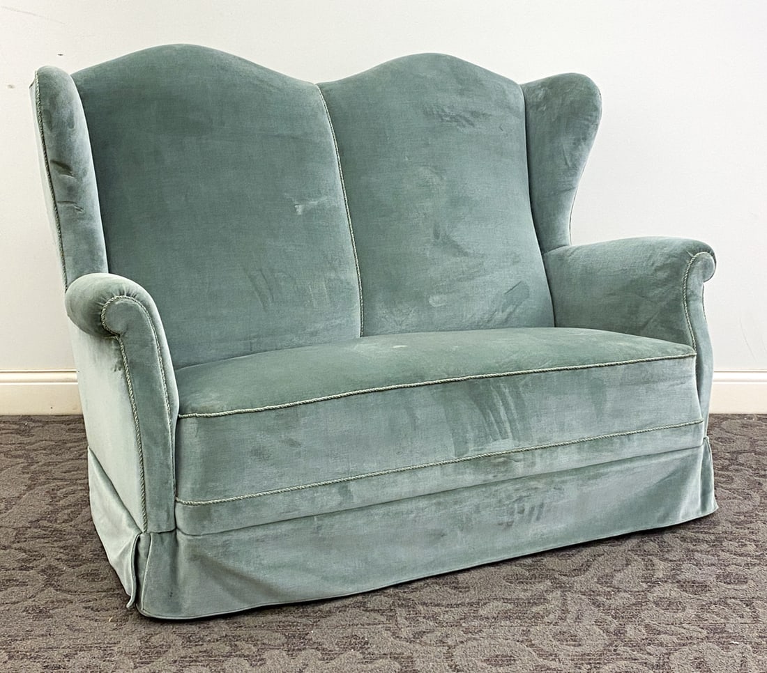 DANISH VELOUR WINGBACK LOVESEAT SOFA C. 1950S: Denmark, circa 1950s. Dimension: H 39.5" x W 56" x D 31" x Sh 15.5" Condition: Surface wear consistent with age and use, including thinning and balding to upholstery. Tears to back.