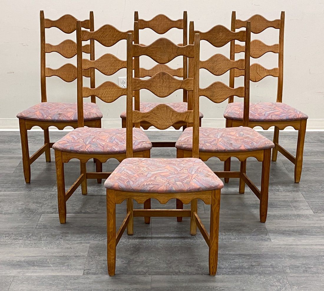 6 ATTR. HENNING KJAERNULF DANISH OAK DINING CHAIRS: Apparently unmarked. Carved oak frame and purple-like upholstery. Denmark, circa 1970s. Dimensions: H 40'' x W 20'' x D 16'' x SH 18'' Condition: Wear consistent with age and use.