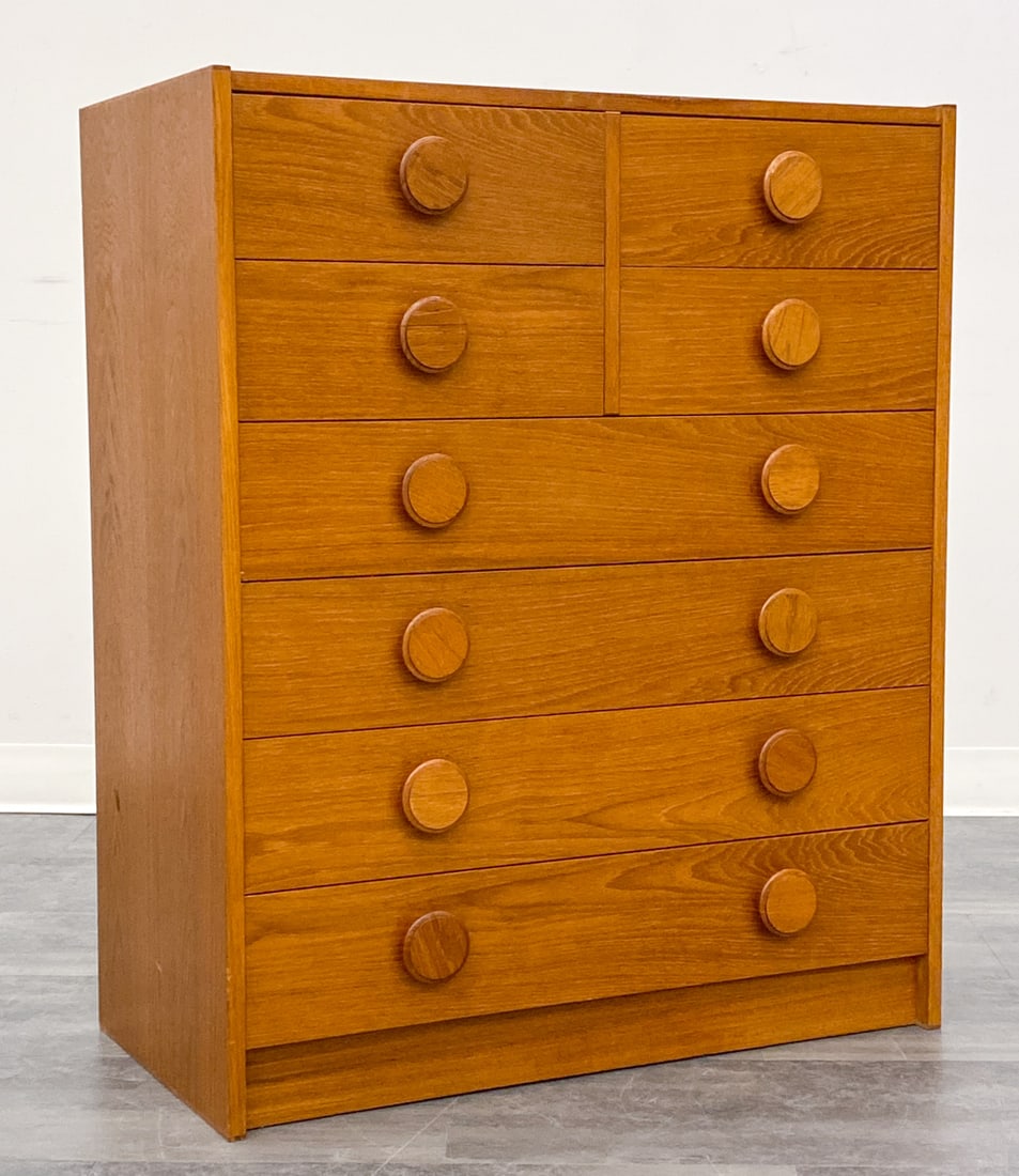 DANISH TEAK CHEST OF DRAWERS C. 1960S: Eight-drawers with round pulls. Denmark, circa 1960s. Dimensions: H 37'' x W 31'' x D 15.75'' Condition: Wear consistent with age and use. Minor scuffs.