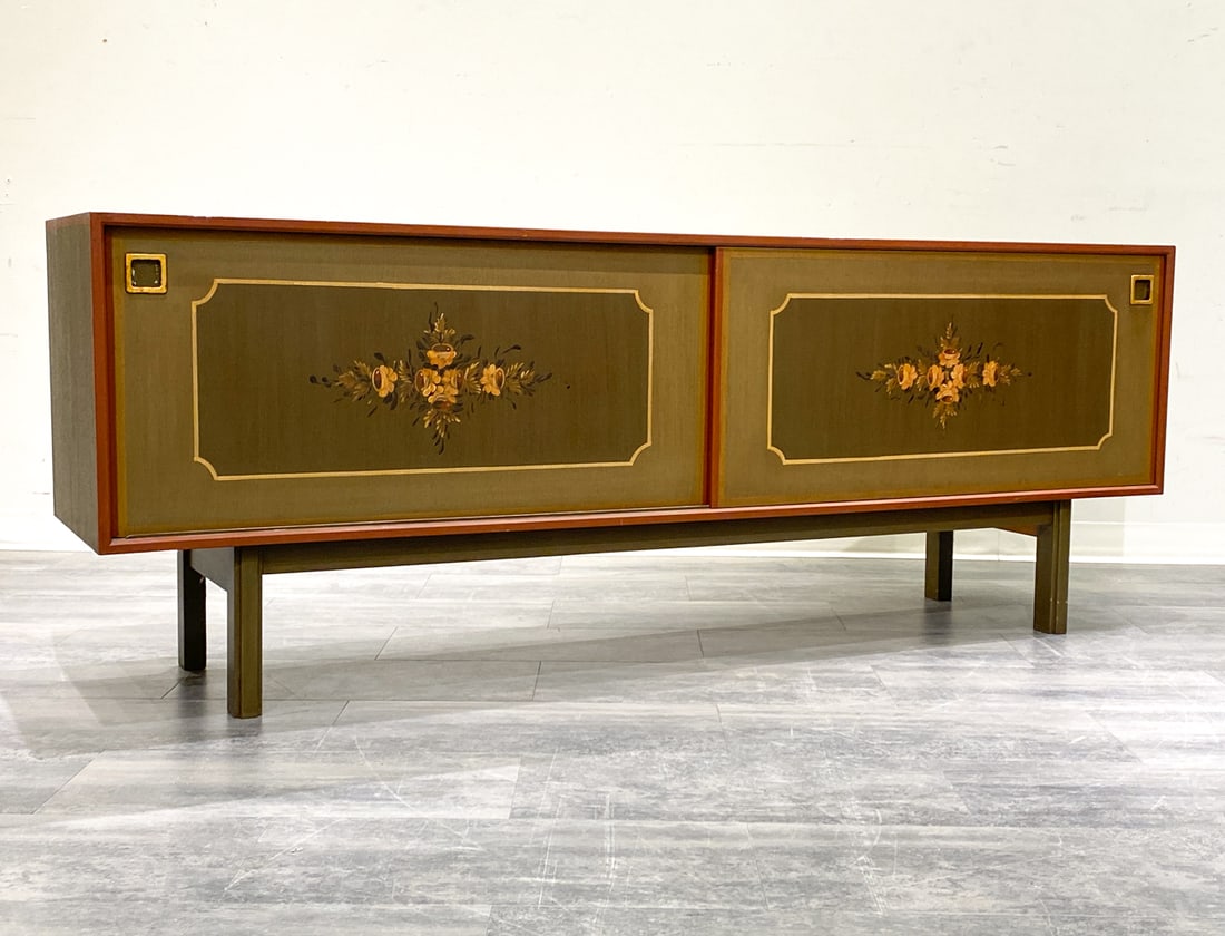 OMANN JUN DANISH PAINTED SIDEBOARD C. 1960S: Featuring two sliding doors with floral painted motif. Marked to back. Denmark, circa 1960s. Dimensions: H 31'' x W 82.75'' x D 18.75'' Condition: Wear consistent with age and use. Minor scuffs.