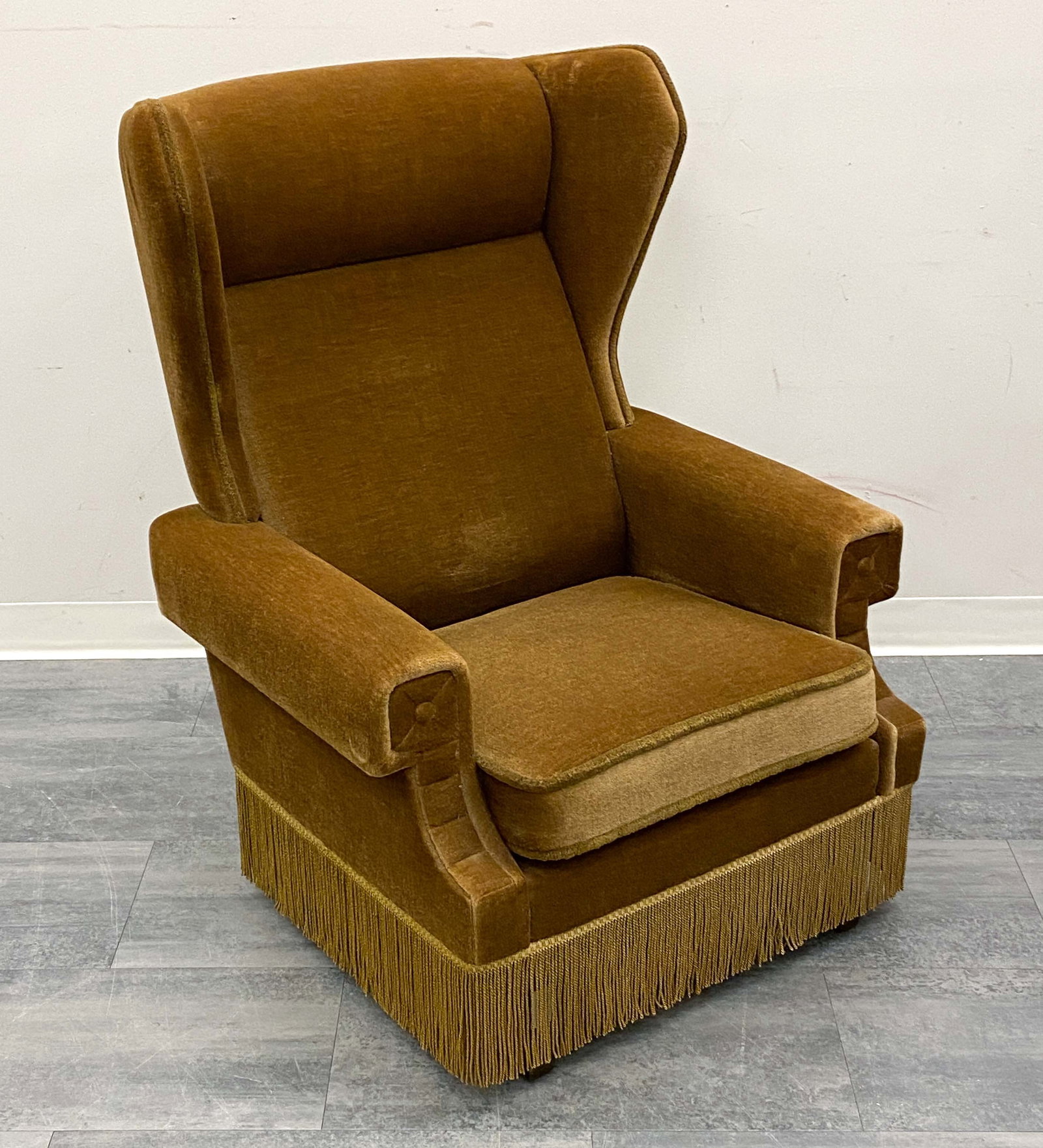 VINTAGE SCANDINAVIAN MOHAIR WINGBACK LOUNGE CHAIR: Round arms, and mohair upholstery. Circa 1950s. Dimensions: H 42" x W 32" x D 31" x SH 16.5" Condition: Wear consistent with age and use. Some fading spots.