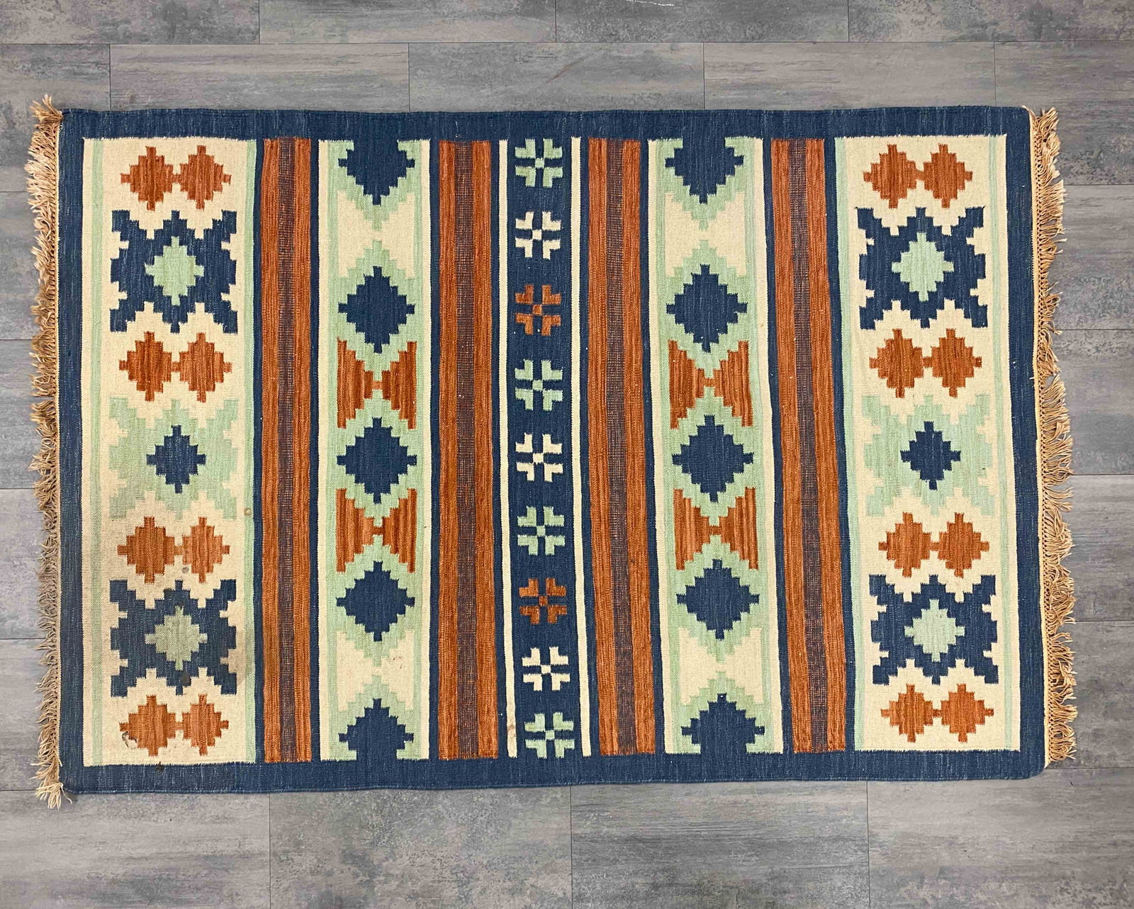 SWEDISH FLATWEAVE KILIM RUG C. 1960S: Apparently unmarked. Dimensions: H 82" x W 55" Condition: Wear consistent with age and use. Couple of marks to surface, minor soiling spot.