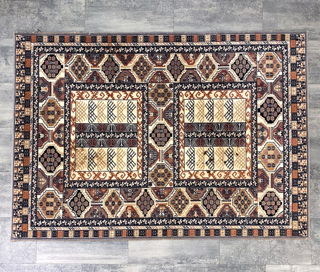 LOUIS DE POORTERE BELGIAN KHAMIR RUG: Marked to back. Belgium Dimensions: L 78'' x W 55'' Conditions: wear consistent with age and use. Minor soiling to fabric. Some frying to edges.