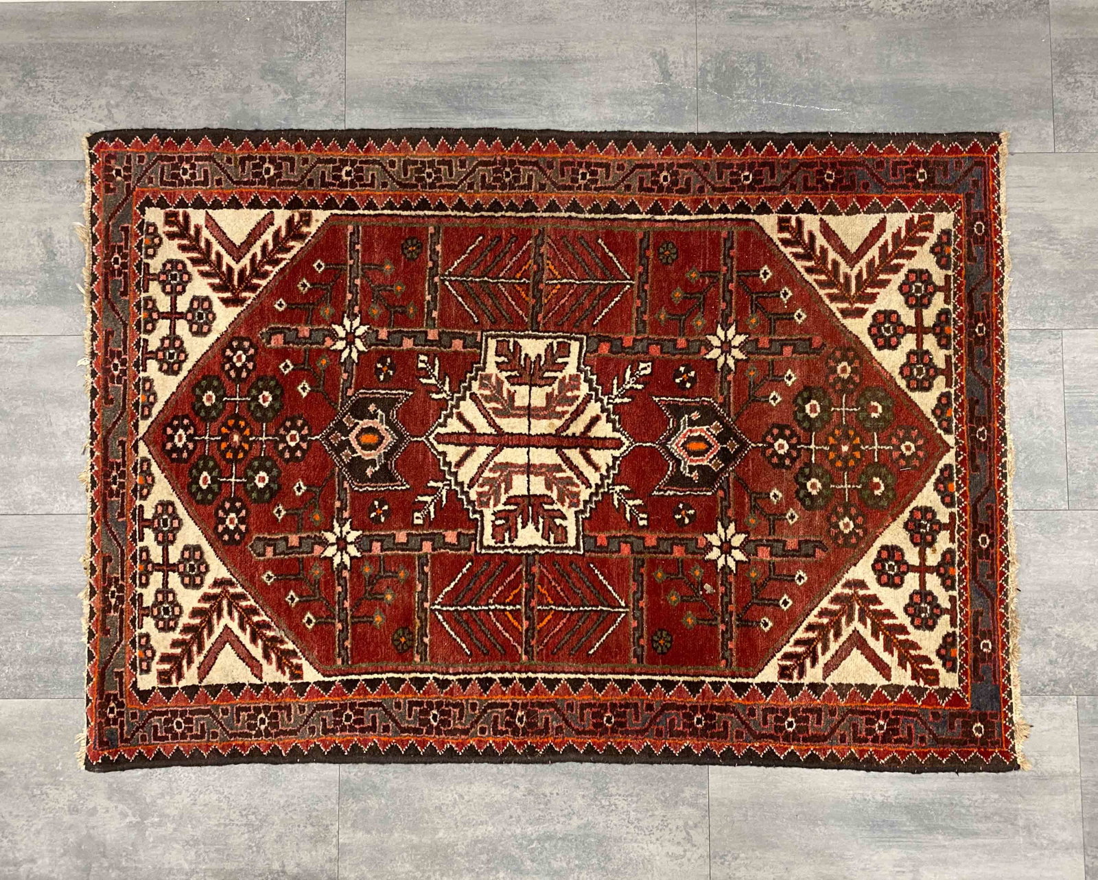 BELLE KUNST PERSIAN RUG C. 1960S: Marked underneath. Dimensions: H 61" x W 42" Condition: Wear consistent with age and use. Loss to fringes, discoloration, fading.
