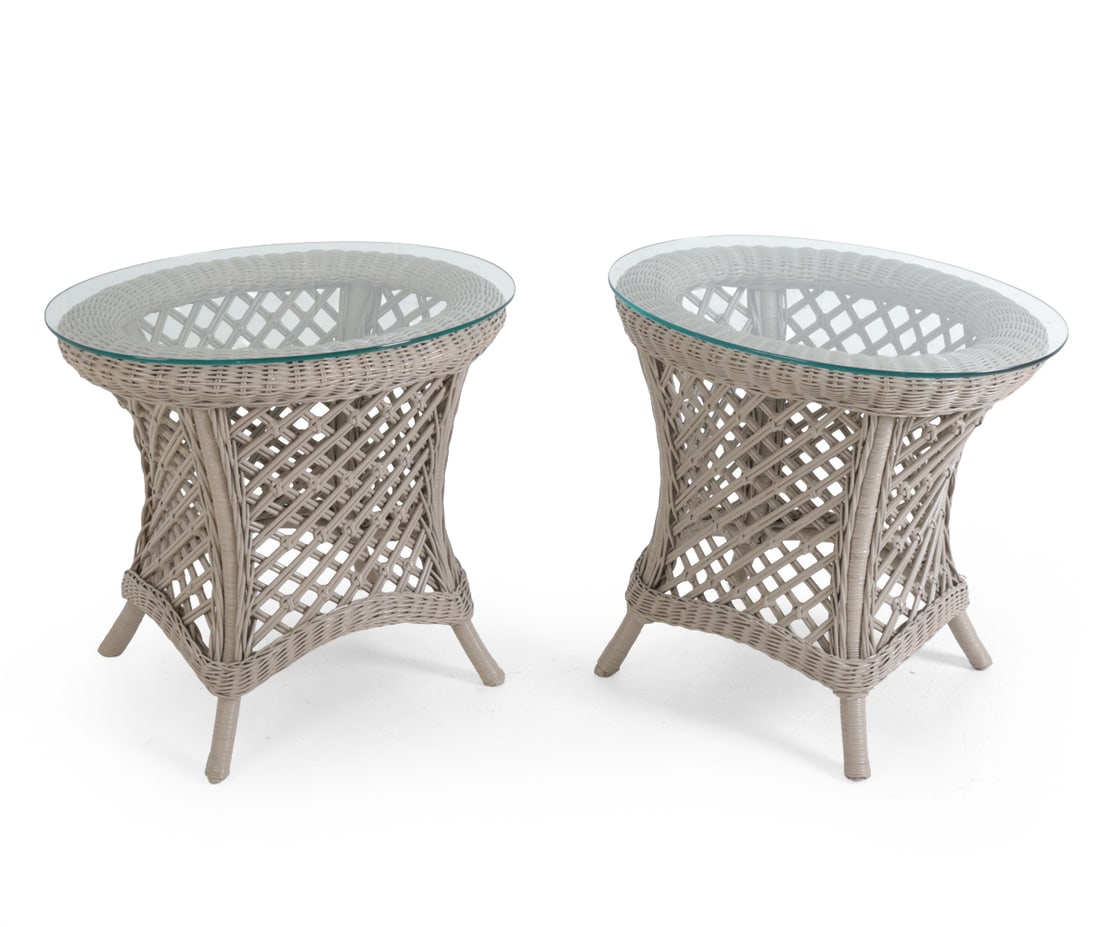 PAIR OF WICKER & GLASS TOP SIDE TABLES: Pair of side tables in grey painted finish with glass tops. 20th century. Dimensions: H 24" x W 27" x D 21". Condition: Faint scuffs, wear consistent with age and use.