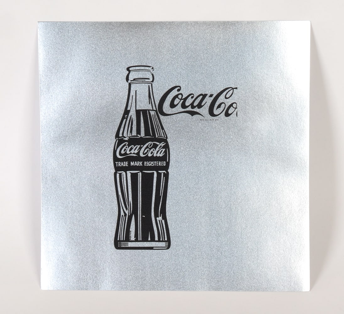ANDY WARHOL COCA-COLA LITHOGRAPH ON SILVER PAPER: This is a 1985 lithograph on silver paper of Andy Warhol's iconic pop-art "Coca-Cola". Stamped on verso "Yoshida Hanga Gallery Tokyo" & "Andy Warhol SILVER FACTORY Yoshida Hanga Gallery 1985". This