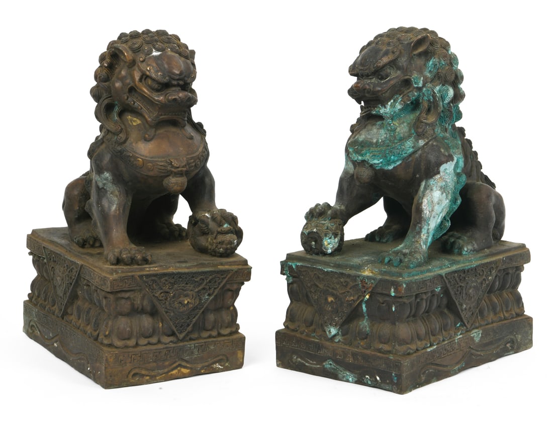 PAIR ANTIQUE CHINESE BRONZE FOO LION STATUES: Patina from outdoor exposure. Weight: 36 LBS each, 72 LBS total weight. Dimensions: H 17" x W 11" x D 7.5" Condition: Wear consistent with age and use. Soiling, patina, and rubs. Surface marks.