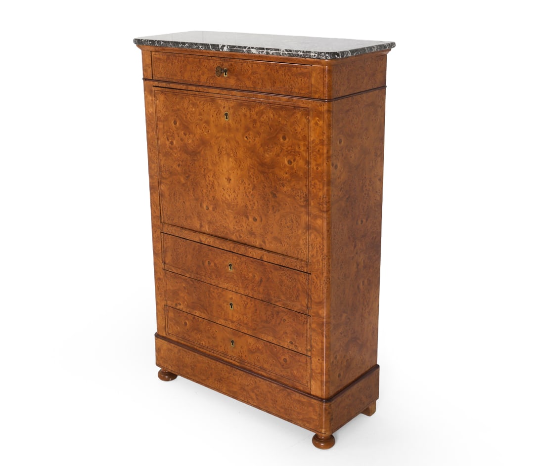 BIEDERMEIER STYLE BURL WALNUT SECRETARY CHEST: Key included. Burl walnut frame and black marble top with drawer. Drop-leaf door to a writing surface and interior cabinet containing small compartments and drawers. Three large lower drawers below. 2