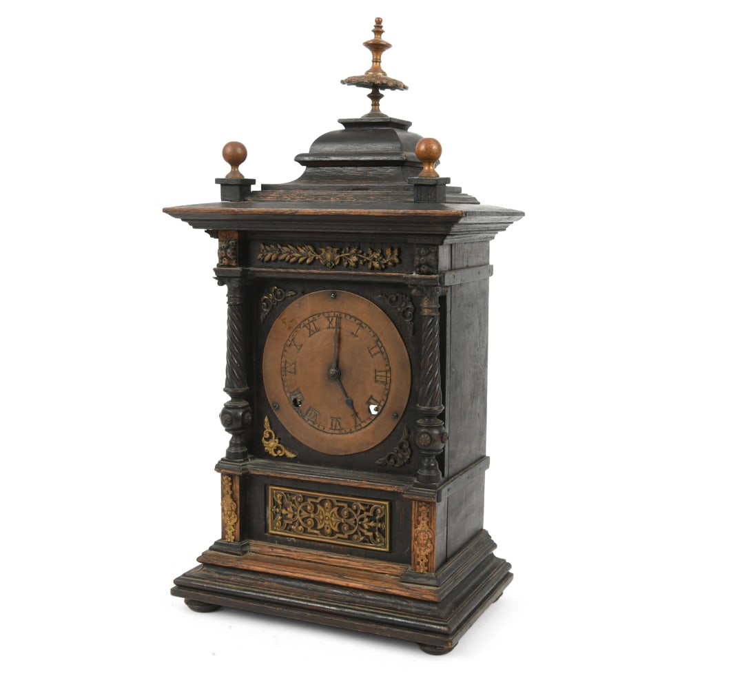 19TH C. CARVED WALNUT MANTEL CLOCK: Dimensions: H 23" x W 12" x D 6.5" Condition: Time keeping untested.