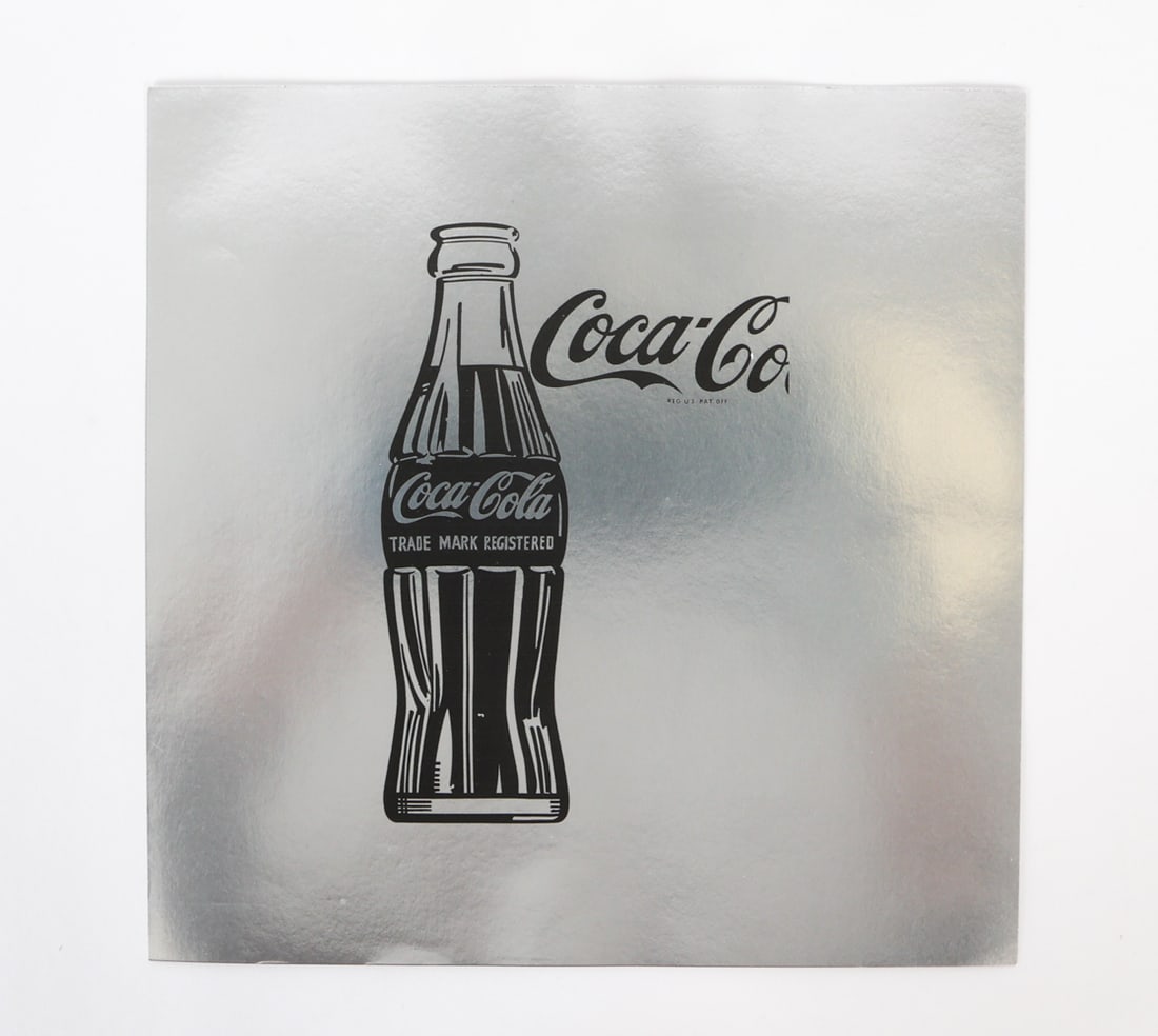 ANDY WARHOL COCA-COLA LITHOGRAPH ON SILVER PAPER: This is a 1985 lithograph on silver paper of Andy Warhol's iconic pop-art "Coca-Cola". Stamped on verso "Yoshida Hanga Gallery Tokyo" & "Andy Warhol SILVER FACTORY Yoshida Hanga Gallery 1985". This is