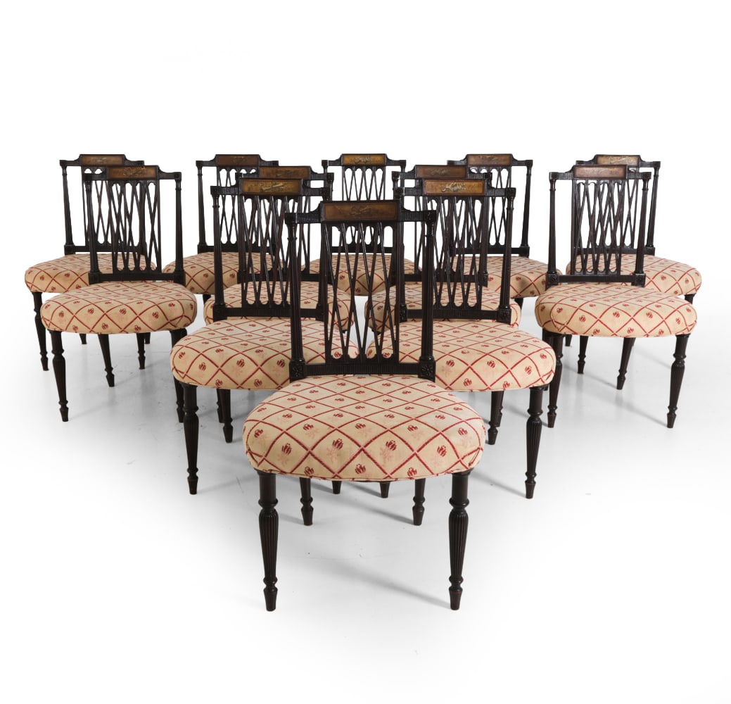(12) REGENCY STYLE MAHOGANY DINING CHAIRS: Mahogany frame with lattice backrest and turned legs and floral upholstery. Dimensions: H 36" x W 21.25" x D 19" Condition: Scuffs, discoloration, and wear of finish. Seat upholstery is discolored and