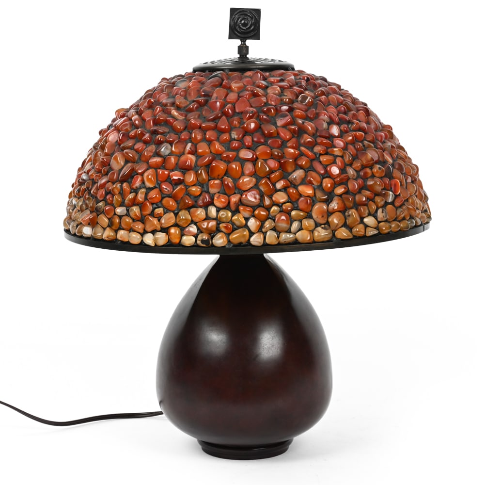 QUOIZEL FOSSIL STONE TABLE LAMP: Remnants of label underneath. Dimensions: H 21" x Dia 16.25" Condition: Untested. Surface marks and wear consistent with age and use.