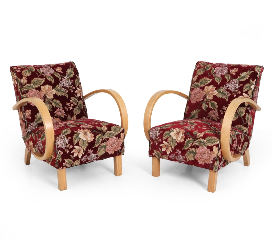 PAIR OF JINDRICH HALABALA LOUNGE CHAIRS C. 1940S: Beech arms and legs with floral pattern upholstery. Apparently unmarked. Czechoslovakia, circa 1940s. Dimensions: H 32.5" x W 26.5" x D 30" x SH 15" Condition: Scuffs and surface marks to arms and