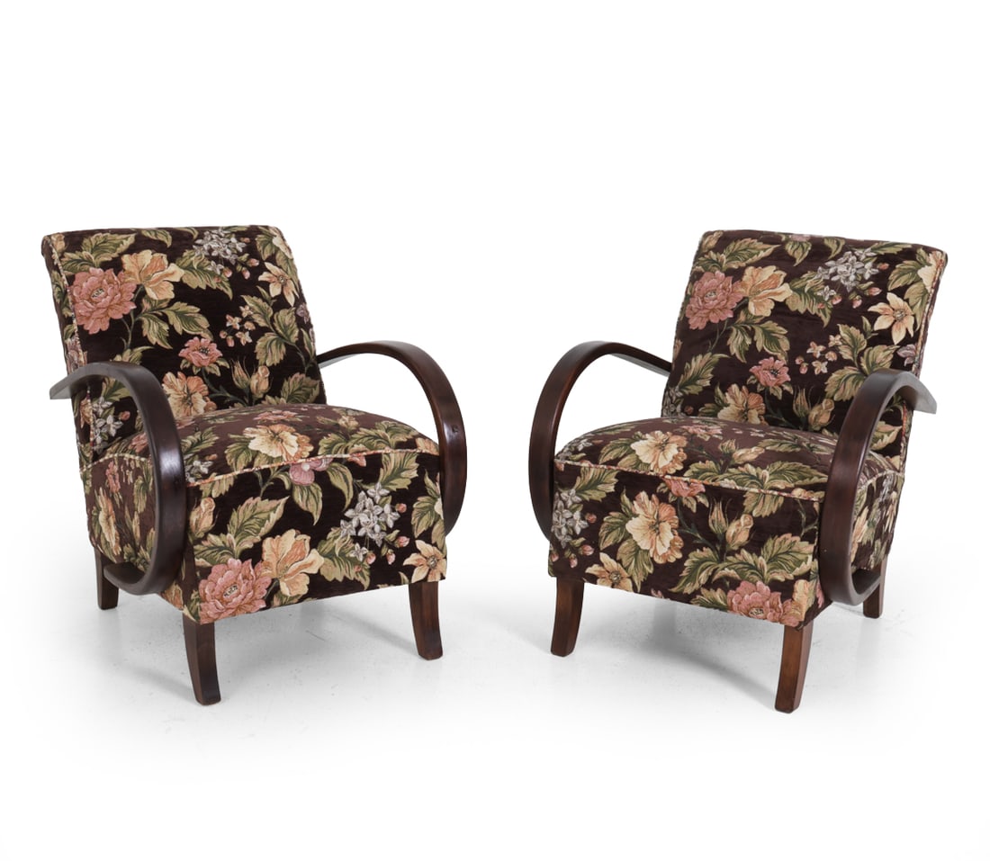 PAIR JINDRICH HALABALA FOR UP ZAVODY LOUNGE CHAIRS: Jindrich Halabala for Up Zavody. Beech frame with floral upholstery. Apparently unmarked. Czechoslovakia, circa 1940s. Dimensions: H 31" x W 24.25" x D 30" x SH 16 Condition: Scuffs, wear of finish, a