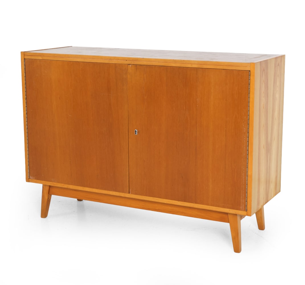 LISOVSKY NABYTEK CZECH WALNUT SIDEBOARD C. 1960S: Walnut and oak frame. Marked to backside. Key included. Czechoslovakia, circa 1960s. Dimensions: H 31.5" x W 44.5" x D 15.25" Condition: Scuffs, finish loss, and discoloration. Wear consistent with ag