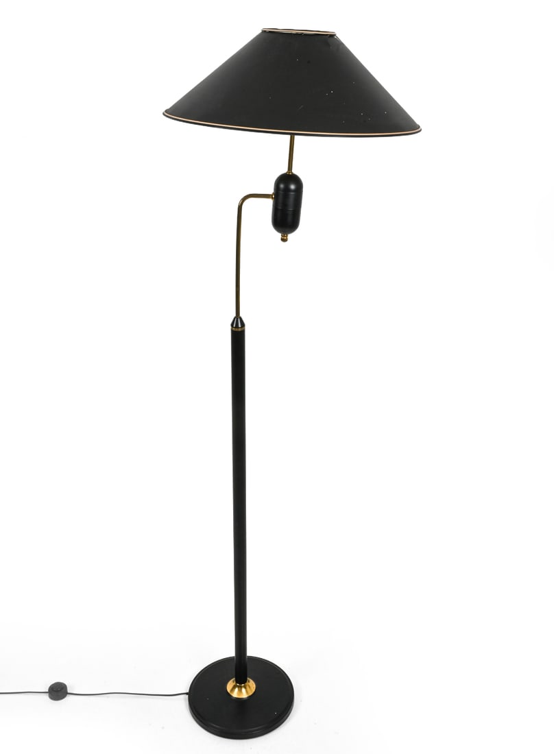 JANPA POLISH FLOOR LAMP: Black metal stem and a circular base with brass neck accents. Marked underneath. Poland, 20th century. Dimensions: H 65.5" x W 19" Condition: Scuffs and patina of metal. Crack to shade. Wear consisten