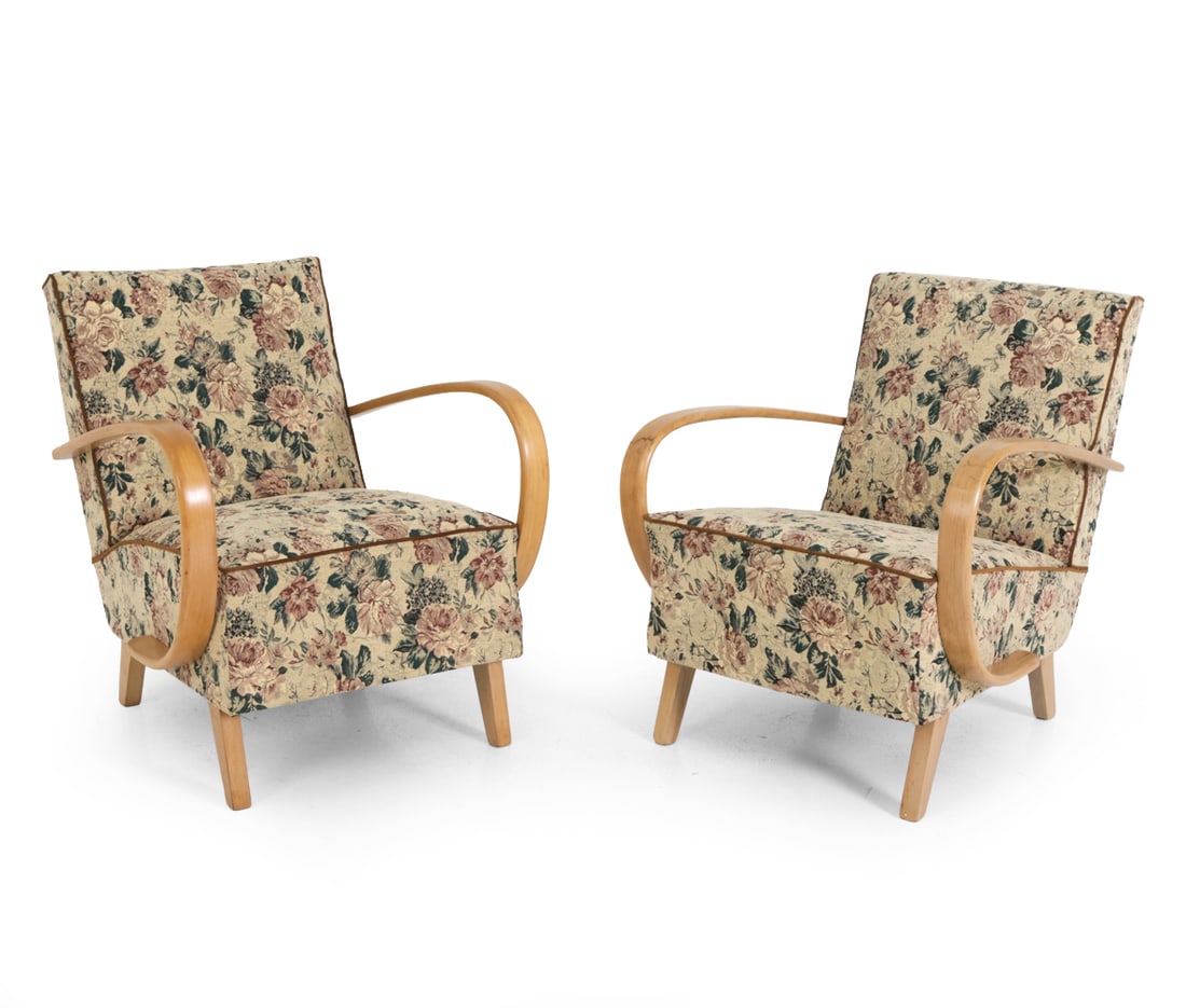 PAIR OF JINDRICH HALABALA LOUNGE CHAIRS C. 1940S: Beech frame with floral upholstery. Jindrich Halabala for UP Zavody. Apparently unmarked. Czechoslovakia, circa 1940s. Dimensions: H 32" x W 27" x D 30.5" x SH 17" Condition: Scuffs and discoloration.