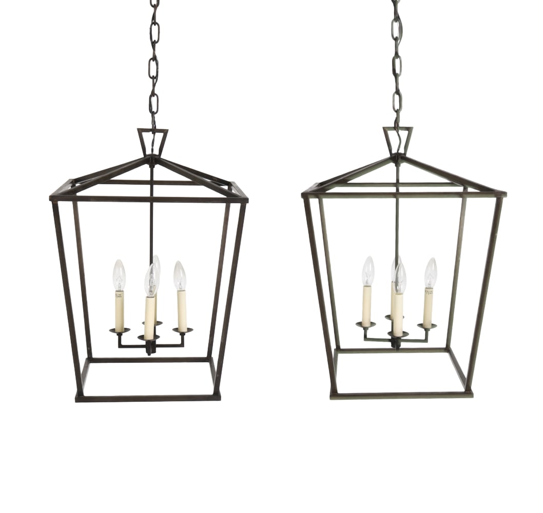PAIR OF VISUAL COMFORT DARLANA IRON LANTERNS: Features open iron frame design with candle style lamps. Apparently unmarked. Dimensions: H 24.5" x W 17" x D 17" Condition: Wear consistent with age and use. Untested. Scuffs, minor rubs.