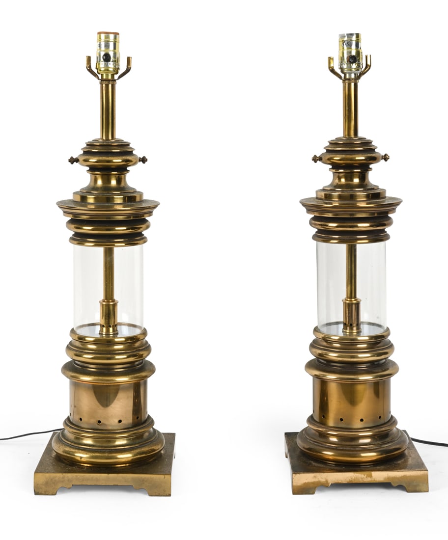 PAIR OF STIFFEL BRASS & GLASS NAUTICAL TABLE LAMPS: Brass with glass center. Dimensions: H 25.75" x W 7.5" Condition: Natural patina of brass. Untested. Wear consistent with age and use.