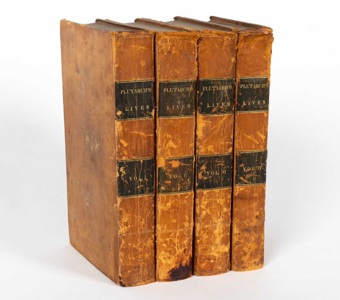 19TH C. PLUTARCH'S LIVES VOLUMES I-IV BOOKS 1828: Grouping of four leather bound books, volumes I-IV. Complete set of four books. Circa 1828. Dimensions: (Each) H 8.75" x W 1.25" x D 5.5" Condition: Bindings with losses, flaking, tears. Age toning to