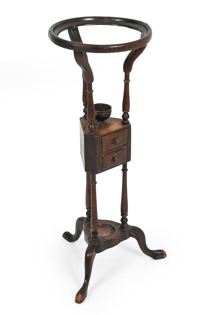 ANTIQUE GEORGIAN MAHOGANY WIG STAND: Wig stand featuring a rounded top with two small drawers below. Apparently unmarked. Dimensions: H 33.5" x W 15.75" x 15" Condition: Wear consistent with age and use. Scuffs and minor scratches to